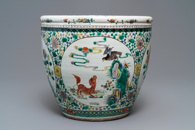 A Chinese famille verte 'mythical beasts' fish bowl, 19th C.