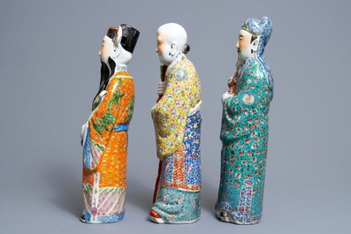 Three Chinese famille rose figures of immortals, 19th C.