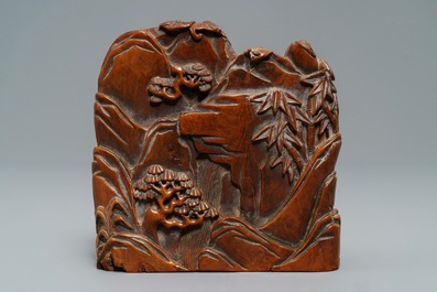 A Chinese carved hardwood group with sages in a garden, 18/19th C.