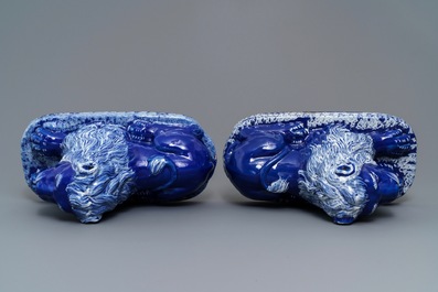 A pair of blue-ground models of recumbent lions, Saint-Omer, France, late 18th C.