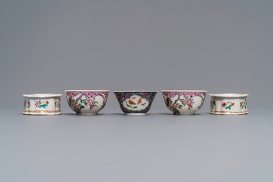 Three Chinese famille rose cups and saucers and a pair of salts, Qianlong and later