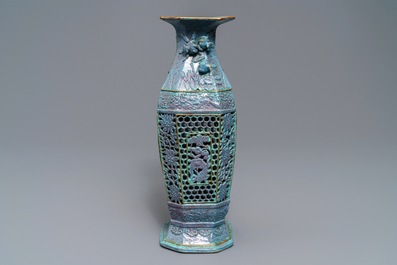 A Chinese reticulated robin's egg-ground qianjiang cai vase, 19th C.