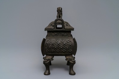 A large Chinese bronze incense burner and cover, Ming