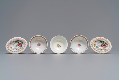 Three Chinese famille rose cups and saucers and a pair of salts, Qianlong and later