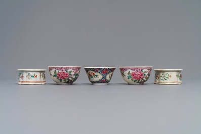 Three Chinese famille rose cups and saucers and a pair of salts, Qianlong and later