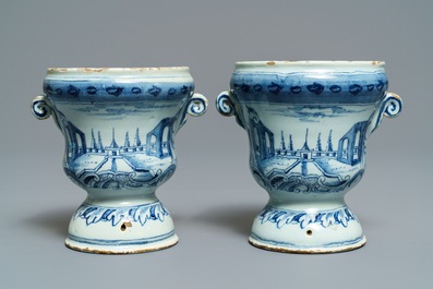 A pair of small Dutch Delft blue and white 'campana' vases on stands, 18th C.
