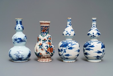 Four small Dutch Delft blue and white and cashmere palette vases, late 17th C.