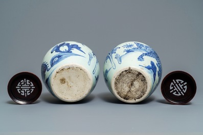 A pair of Chinese blue and white 'qilin' jars, Transitional period