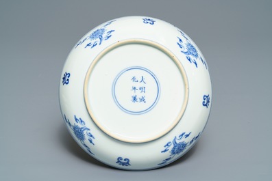 A Chinese famille verte plate with a swastika, Shou-characters and lotus flowers, Chenghua mark, Kangxi