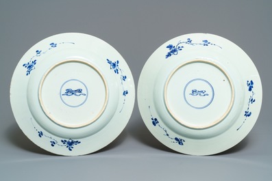 A pair of Chinese blue and white 'flower scroll' dishes, Kangxi