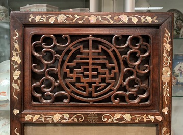 A Chinese mother-of-pearl inlaid wooden screen with silk paintings, 19th C.