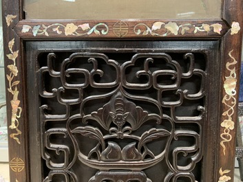 A Chinese mother-of-pearl inlaid wooden screen with silk paintings, 19th C.