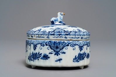 A Dutch Delft blue and white sheep-finial butter tub, 18th C.