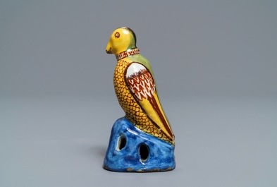 A polychrome Dutch Delft model of a parrot, late 18th C.