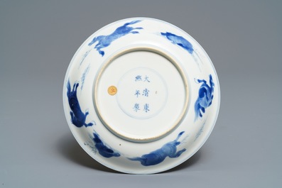 A Chinese blue and white 'Eight horses of Wang Mu' plate, Kangxi mark and of the period