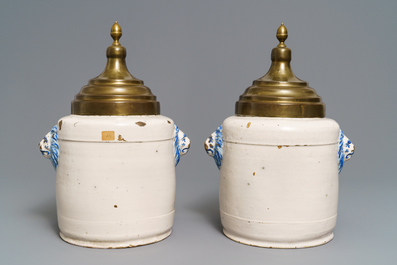 A pair of blue and white Brussels faience tobacco jars, late 18th C.