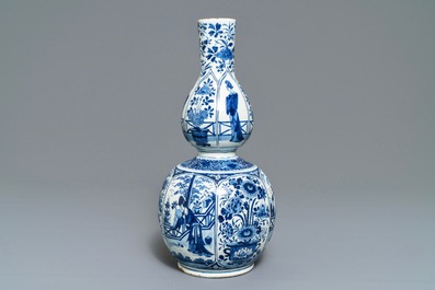 A Dutch Delft blue and white chinoiserie double gourd vase, early 18th C.