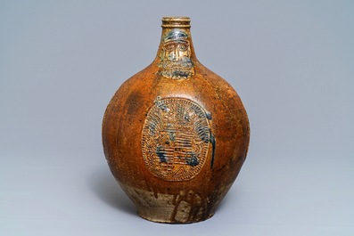 A large German stoneware Bellarmine jug with blue marriage seals, Frechen, 1st half 17th C.