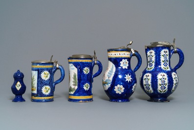 Four pewter-mounted Brussels faience jugs and a shaker, 18/19th C.