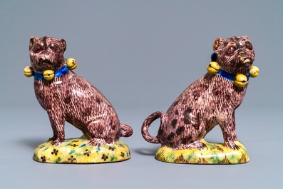 A pair of polychrome Brussels faience models of pugs, 2nd half 18th C.