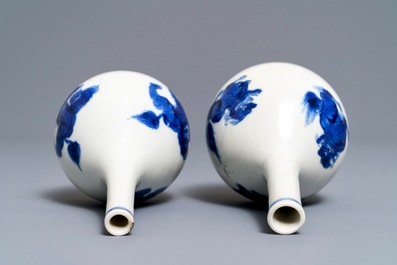 A pair of Chinese blue and white bottle vases with qilins, Kangxi