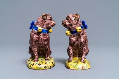 A pair of polychrome Brussels faience models of pugs, 2nd half 18th C.