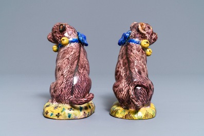 A pair of polychrome Brussels faience models of pugs, 2nd half 18th C.