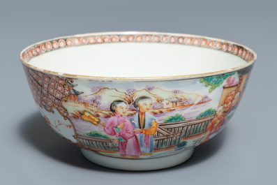 Two Chinese famille rose 'mandarin' bowls and three cups and saucers, Qianlong