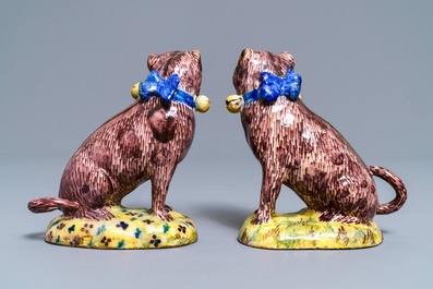 A pair of polychrome Brussels faience models of pugs, 2nd half 18th C.