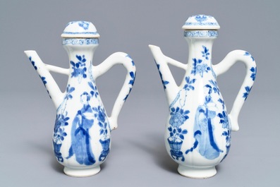 A pair of Chinese blue and white 'Long Eliza' jugs and covers, Kangxi