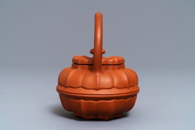 A Chinese Yixing stoneware flower-shaped teapot, Kangxi