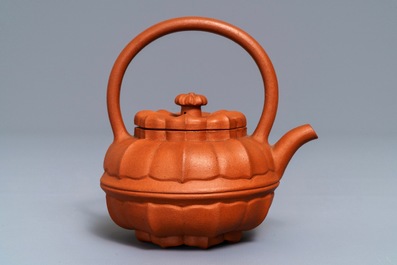 A Chinese Yixing stoneware flower-shaped teapot, Kangxi