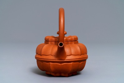 A Chinese Yixing stoneware flower-shaped teapot, Kangxi