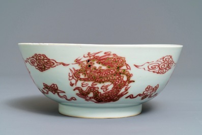 A Chinese underglaze red 'dragons and fish' bowl, 19/20th C.