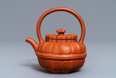 A Chinese Yixing stoneware flower-shaped teapot, Kangxi