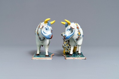 Two polychrome Dutch Delft models of cows on bases, 18th C.