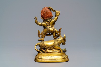 A Sino-Tibetan gilt bronze figure of Yama Dharmaraja, 18/19th C.