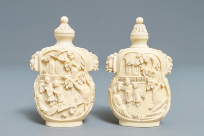 A pair of Chinese carved ivory snuff bottles, 19th C.