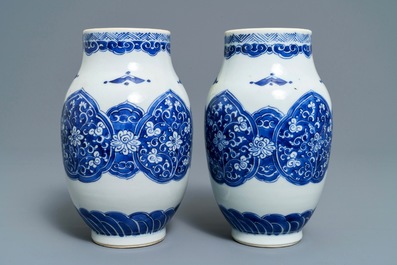 A pair of Chinese blue and white vases and two bowls, Kangxi
