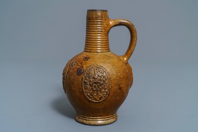 A Belgian stoneware armorial jug with CR monogram, Bouffioulx, 16/17th C.