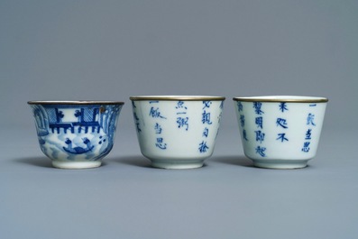 Two Chinese 'Bleu de Hue' Vietnamese market plates and three cups, various marks, 19th C.