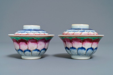 A pair of Chinese famille rose 'lotus' bowls and covers on stands, Qianlong