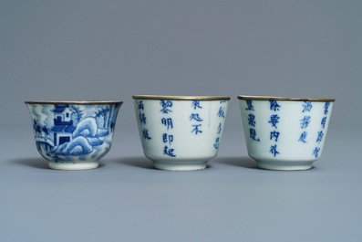 Two Chinese 'Bleu de Hue' Vietnamese market plates and three cups, various marks, 19th C.