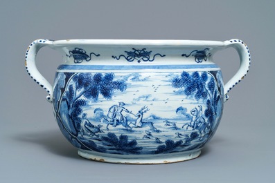 A large Dutch Delft blue and white 'deer hunting' jardiniere, 18th C.