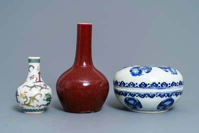 Two Chinese famille verte and sang de boeuf vases and a blue and white 'cranes' box, 19th C.