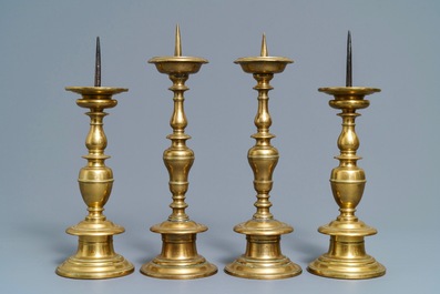 Two pairs of Dutch or Flemish bronze pricket candlesticks, 17th C.
