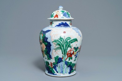 A Chinese wucai vase and cover with figures in a garden, seal mark, Transitional period