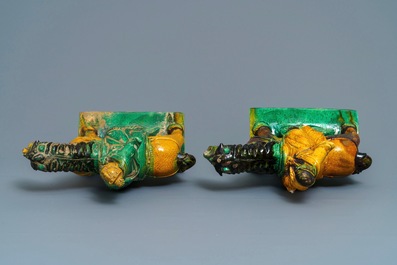 Two Chinese yellow and green-glazed 'horserider' roof tiles, Ming