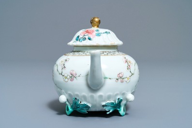 A Chinese famille rose helmet-shaped jug and a relief-decorated teapot, Yongzheng