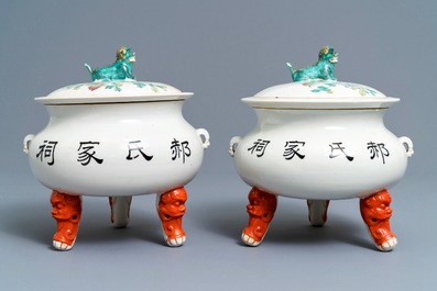 A pair of large Chinese famille rose tripod warming bowls and covers, 19/20th C.